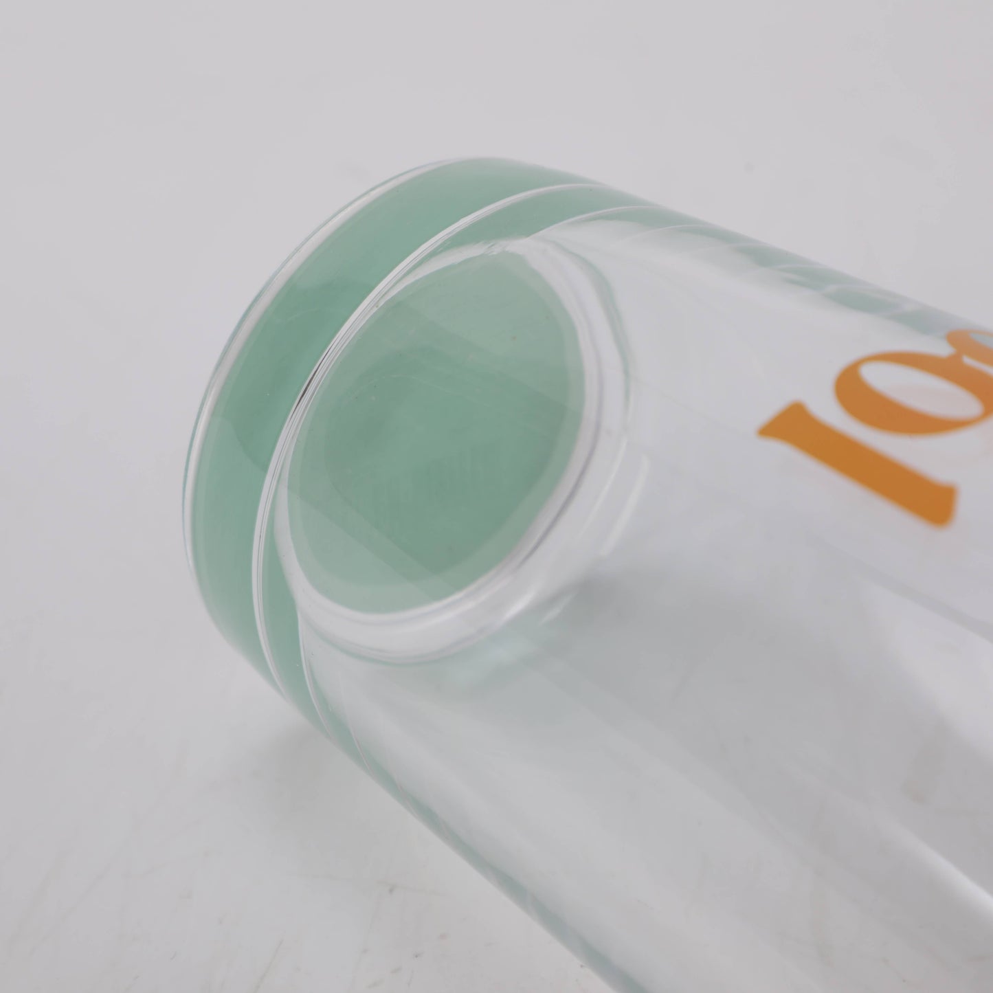 Green Bottom Glass Tumbler with Letters in Orange